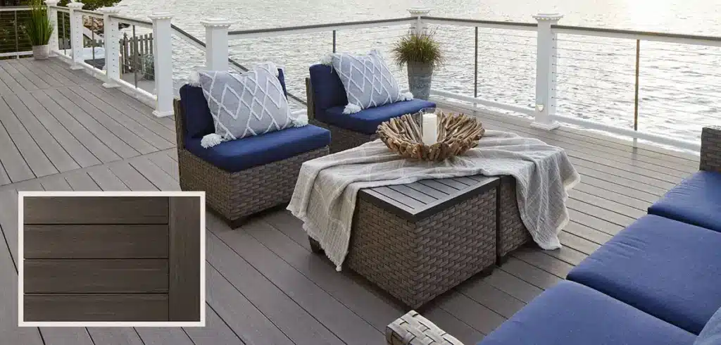A lakeside PVC deck features blue outdoor furniture and light decor with a close-up image of the PVC decking in the lower-left corner.